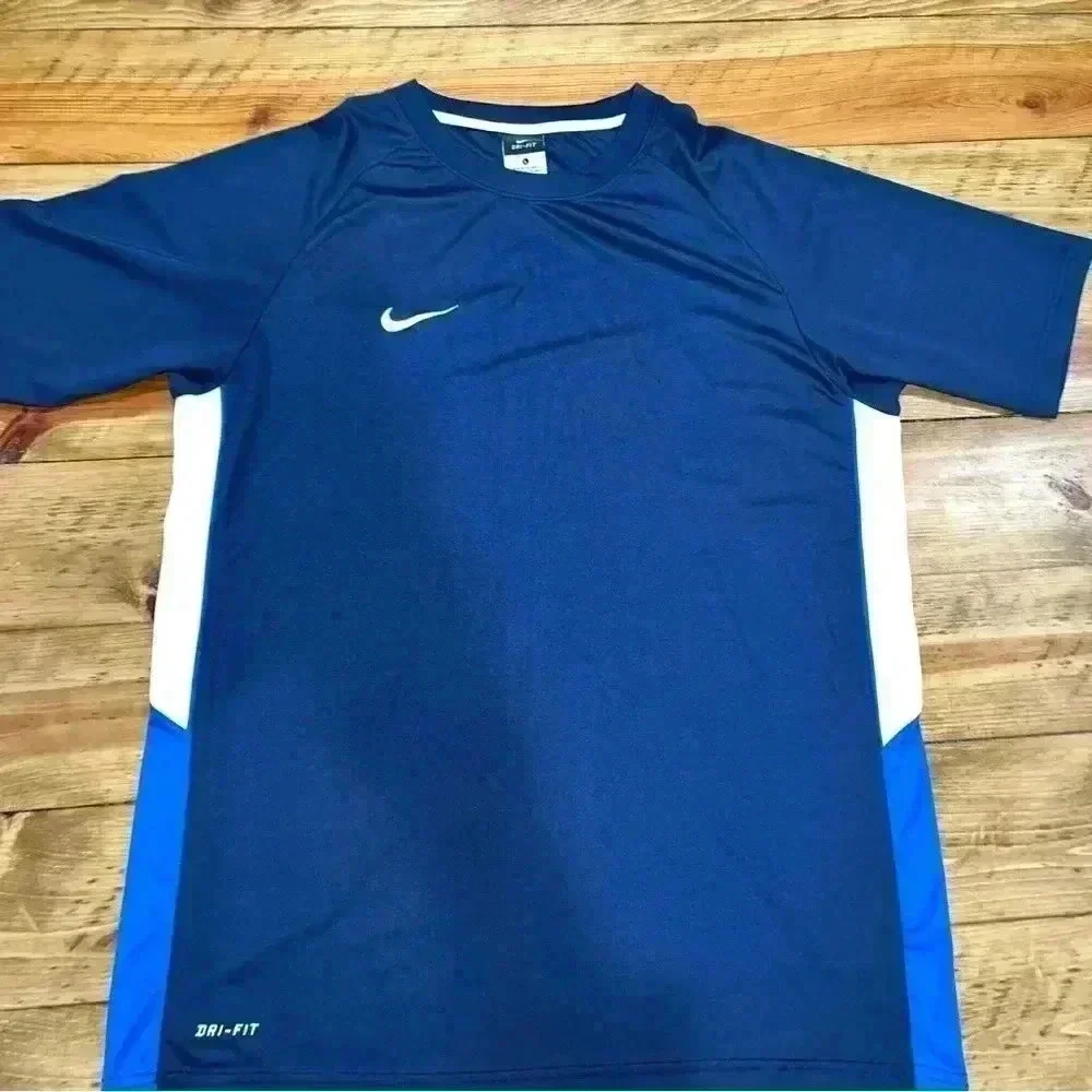 Nike Dri fit vented sides shirt sleeve shirt with Nike emblem on chest
